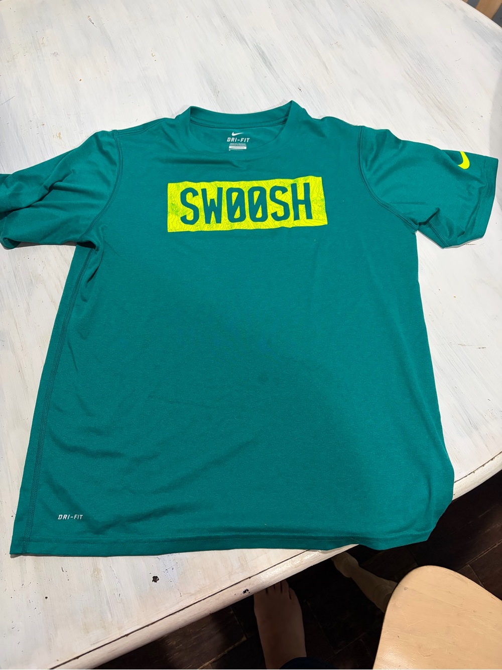 Nike Teal Short Sleeve Tee with Yellow Swoosh Graphic